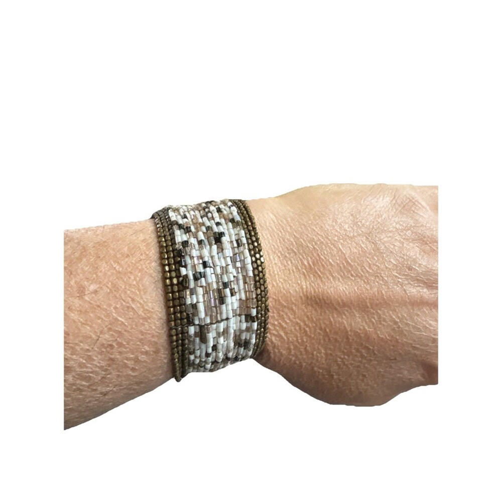 Vintage 90s" or handmade boho-style beaded cuff‎ bracelets.